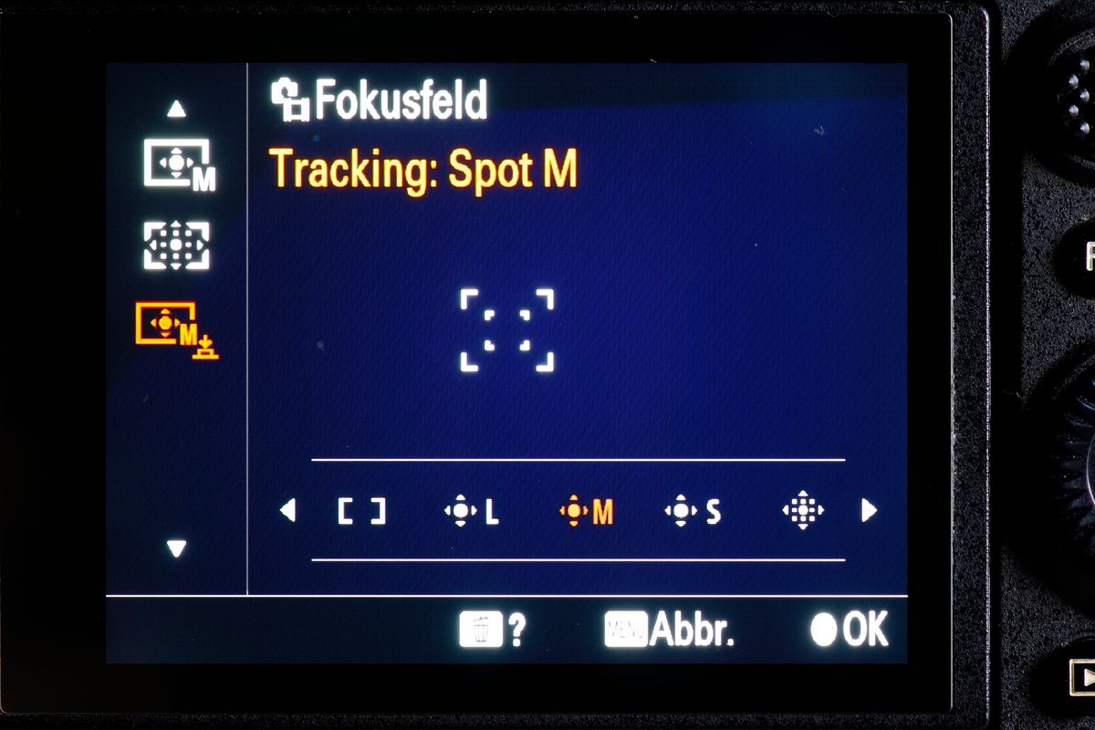 Das Menü zeigt, dass der Tracking AF Spot M eingestellt ist.